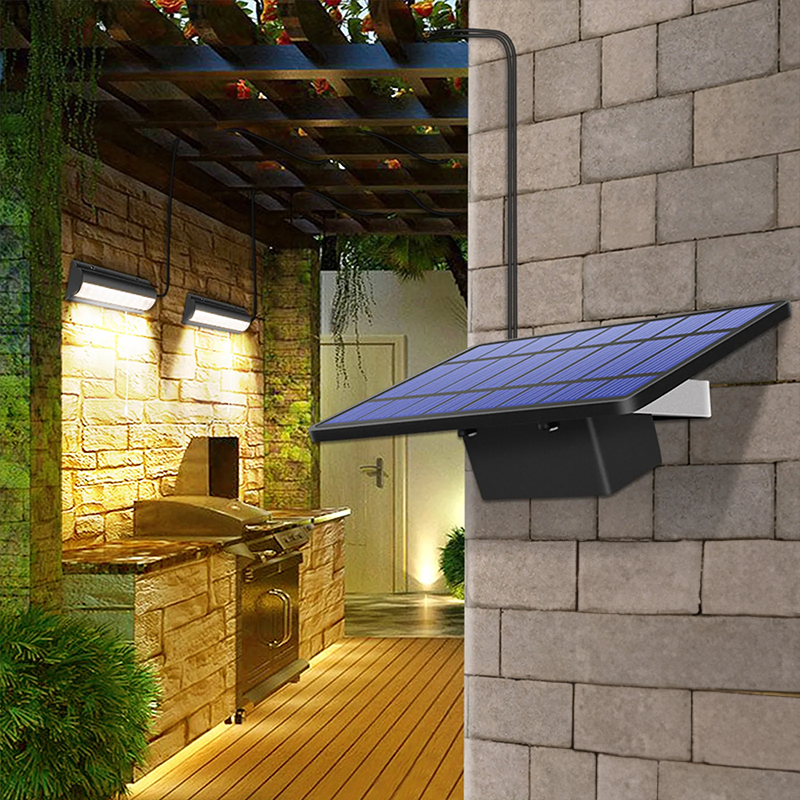 Wall lamp with solar cells and separate panel