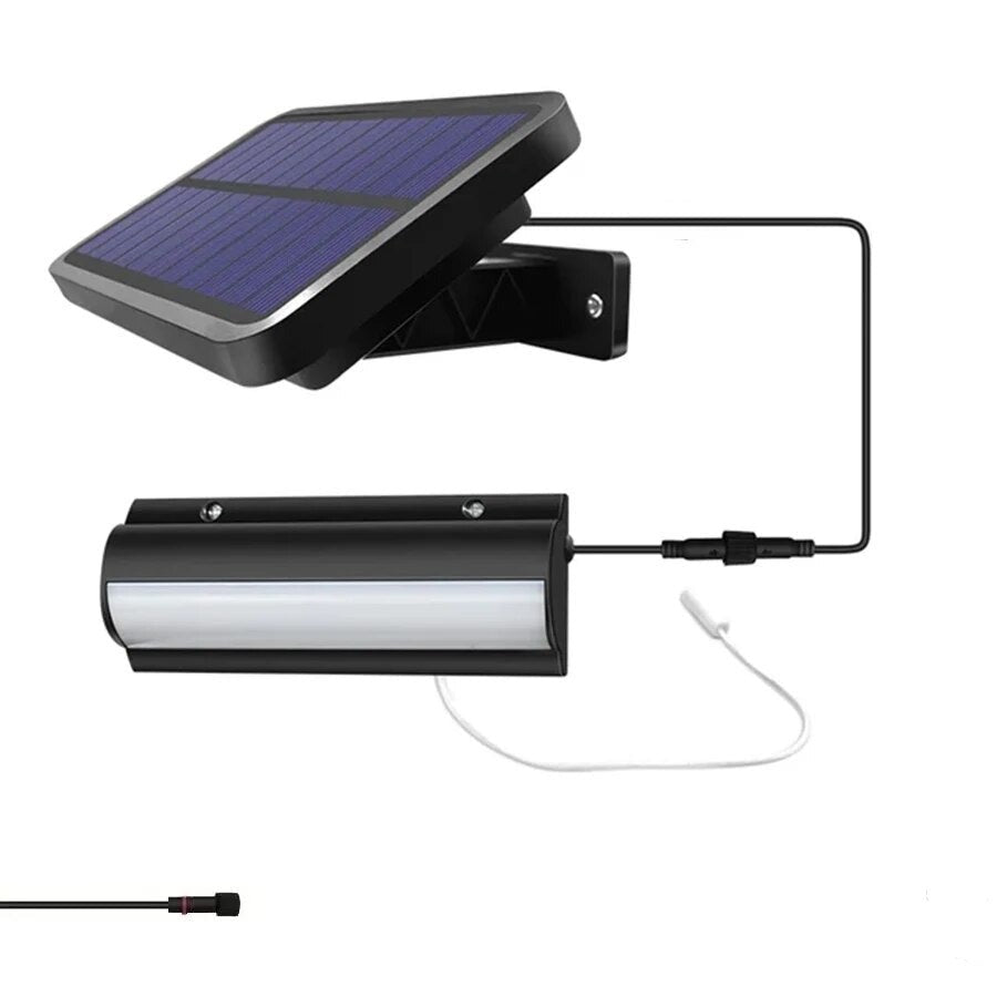 Wall lamp with solar cells and separate panel